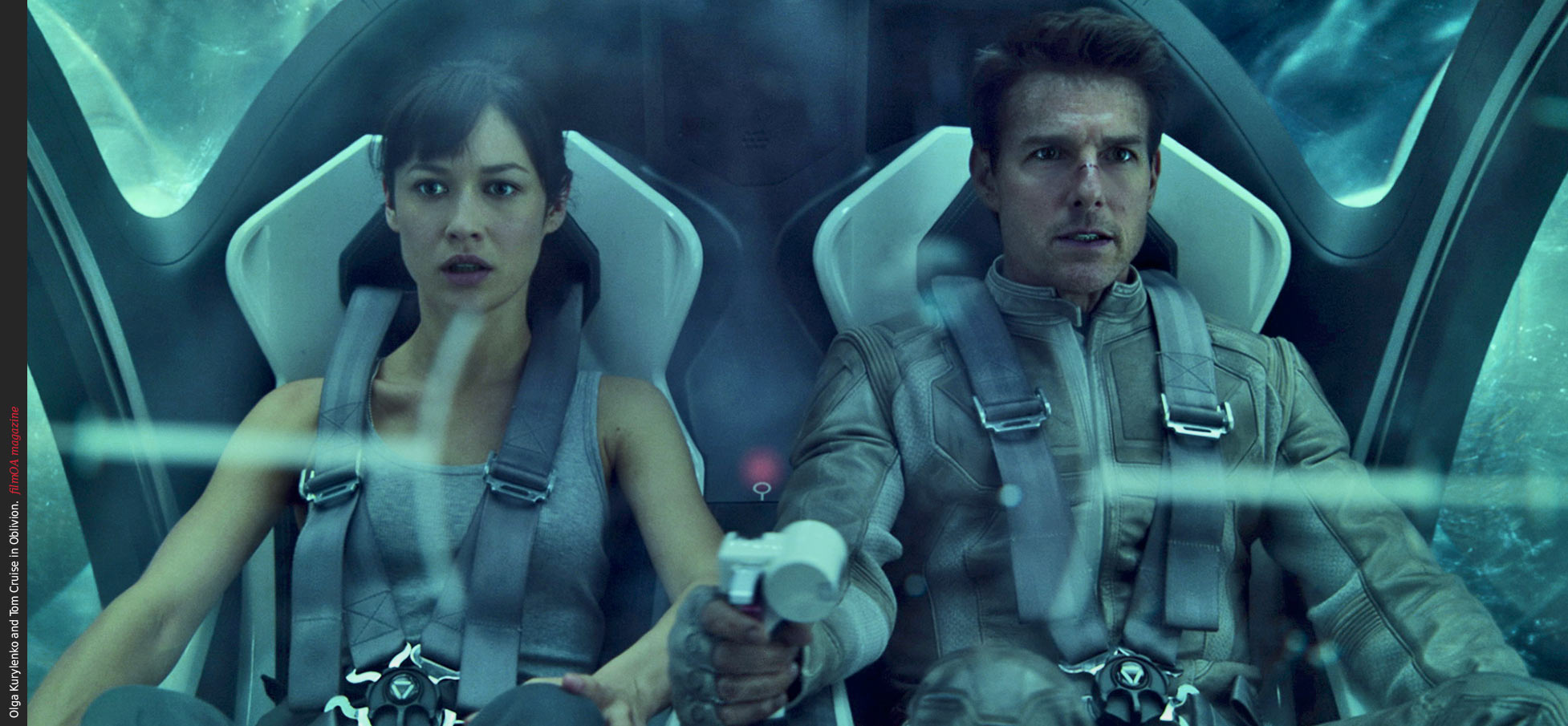 Olga Kurylenko and Tom Cruise ship fly Oblivion