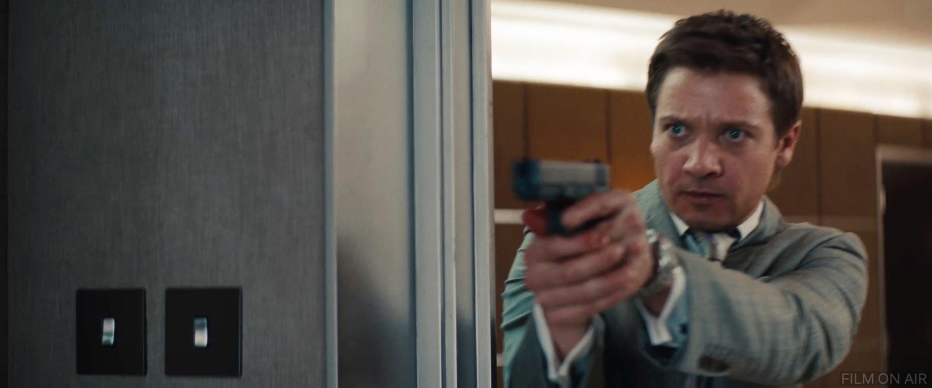 Jeremy Renner Gun
 in Mission: Impossible 4 - Ghost Protocol in Mission: Impossible - Ghost Protocol