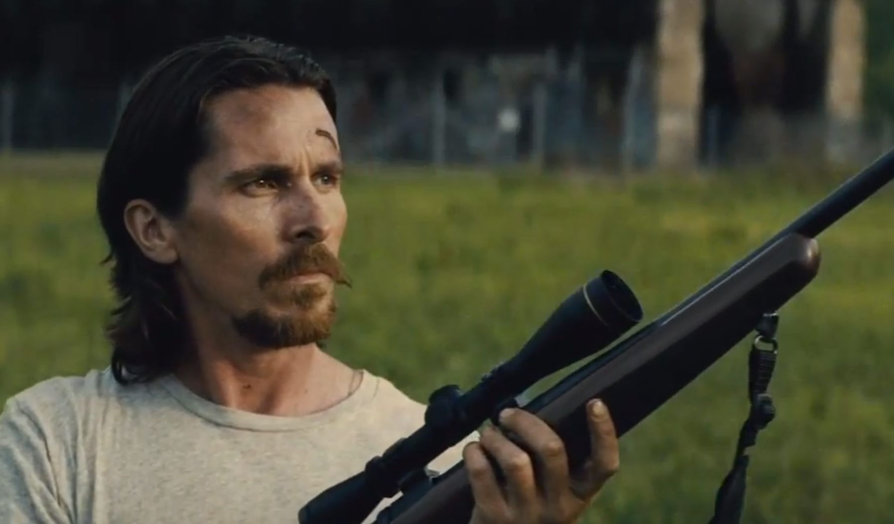 Christian Bale with huge sniper rifle