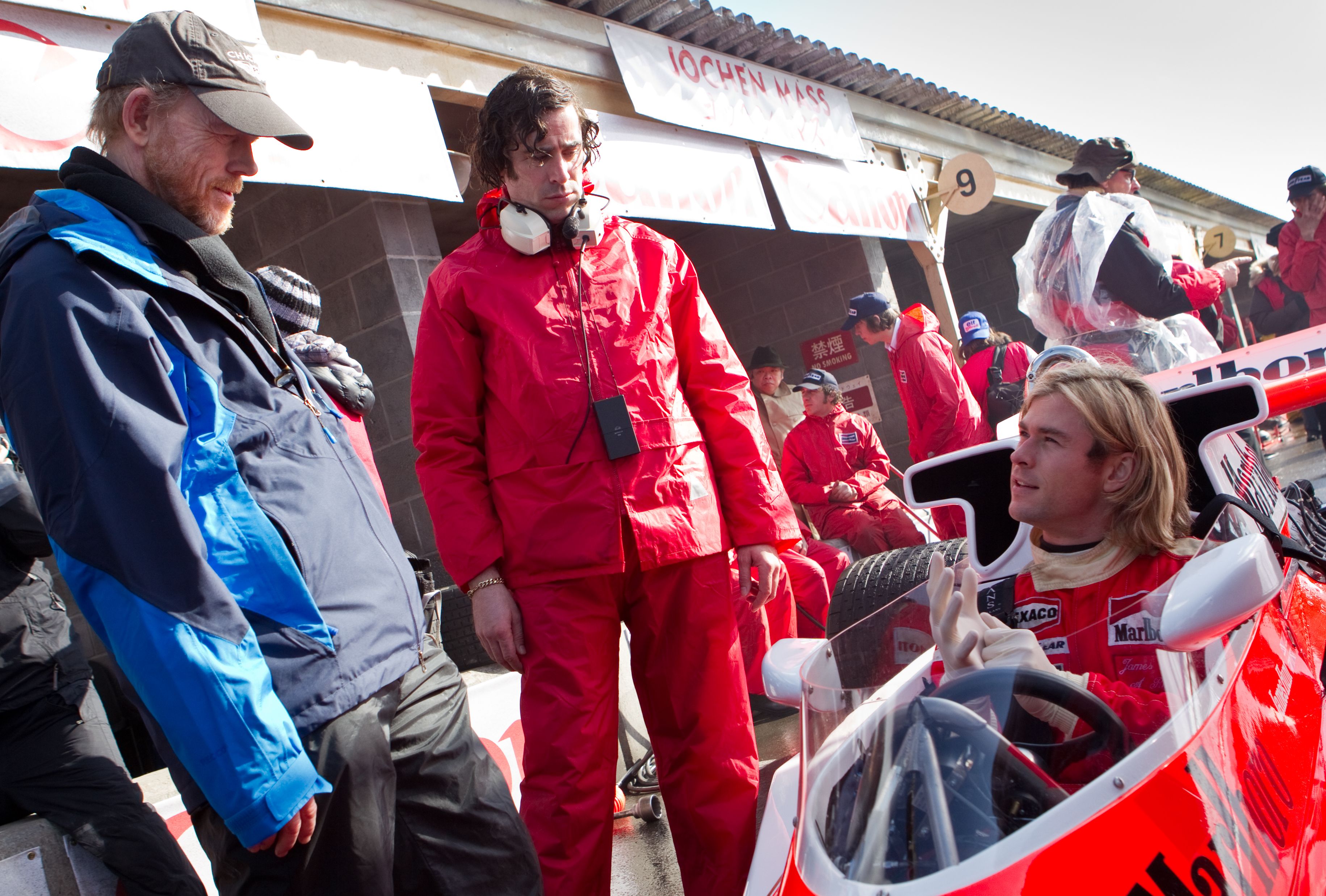 Director Ron Howard and Chris Hemsworth on the set of Rush