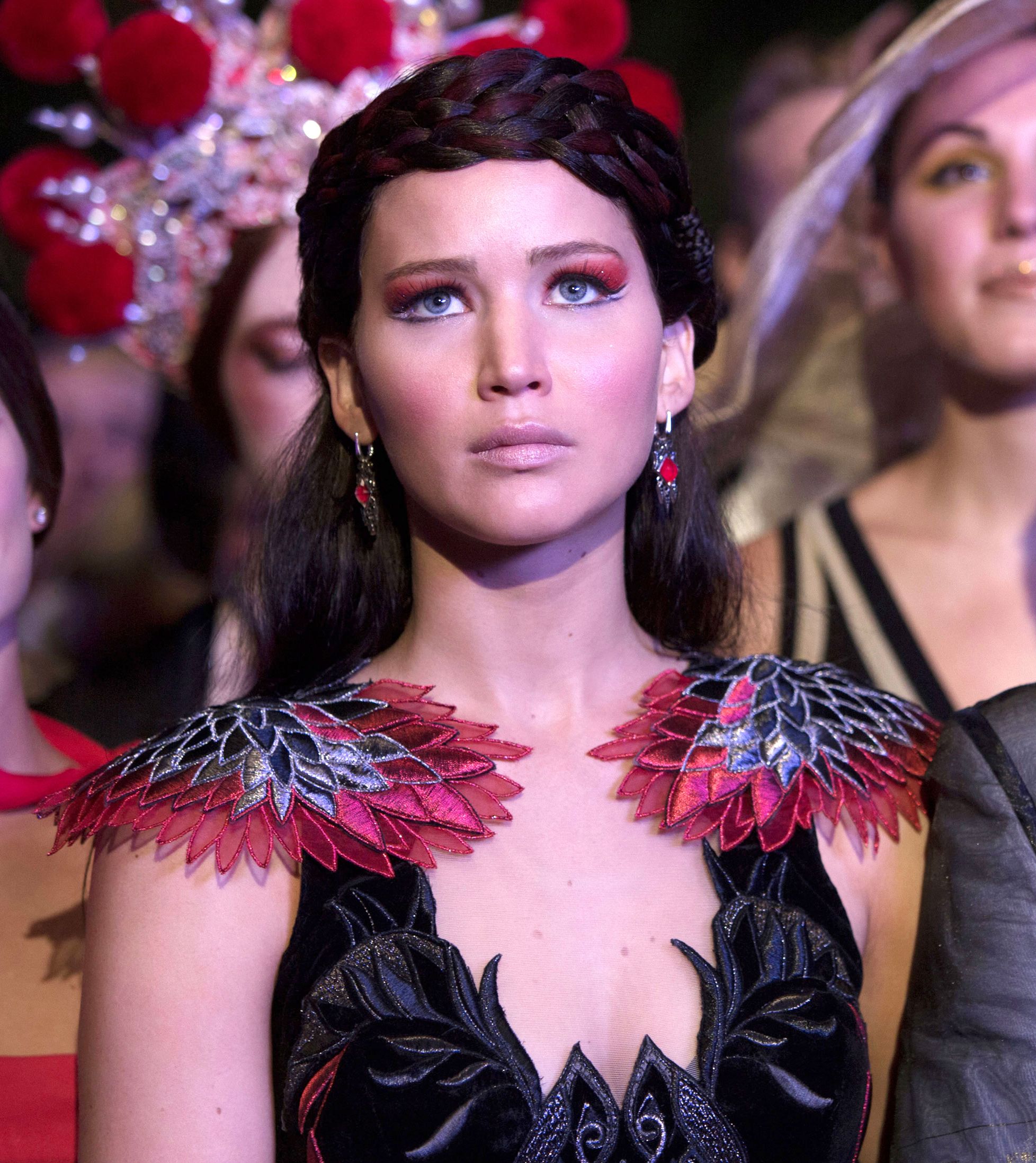 Jennifer Lawrence wears wig and fancy shoulder pads