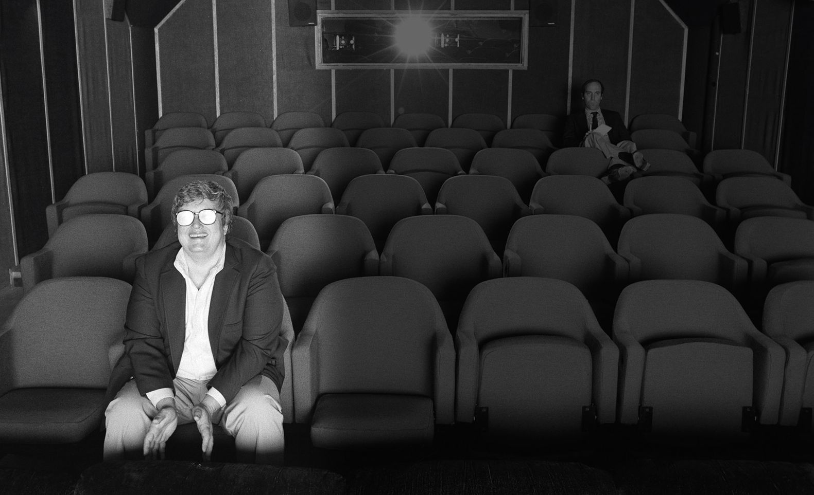 Roger Ebert in the theater watching a movie