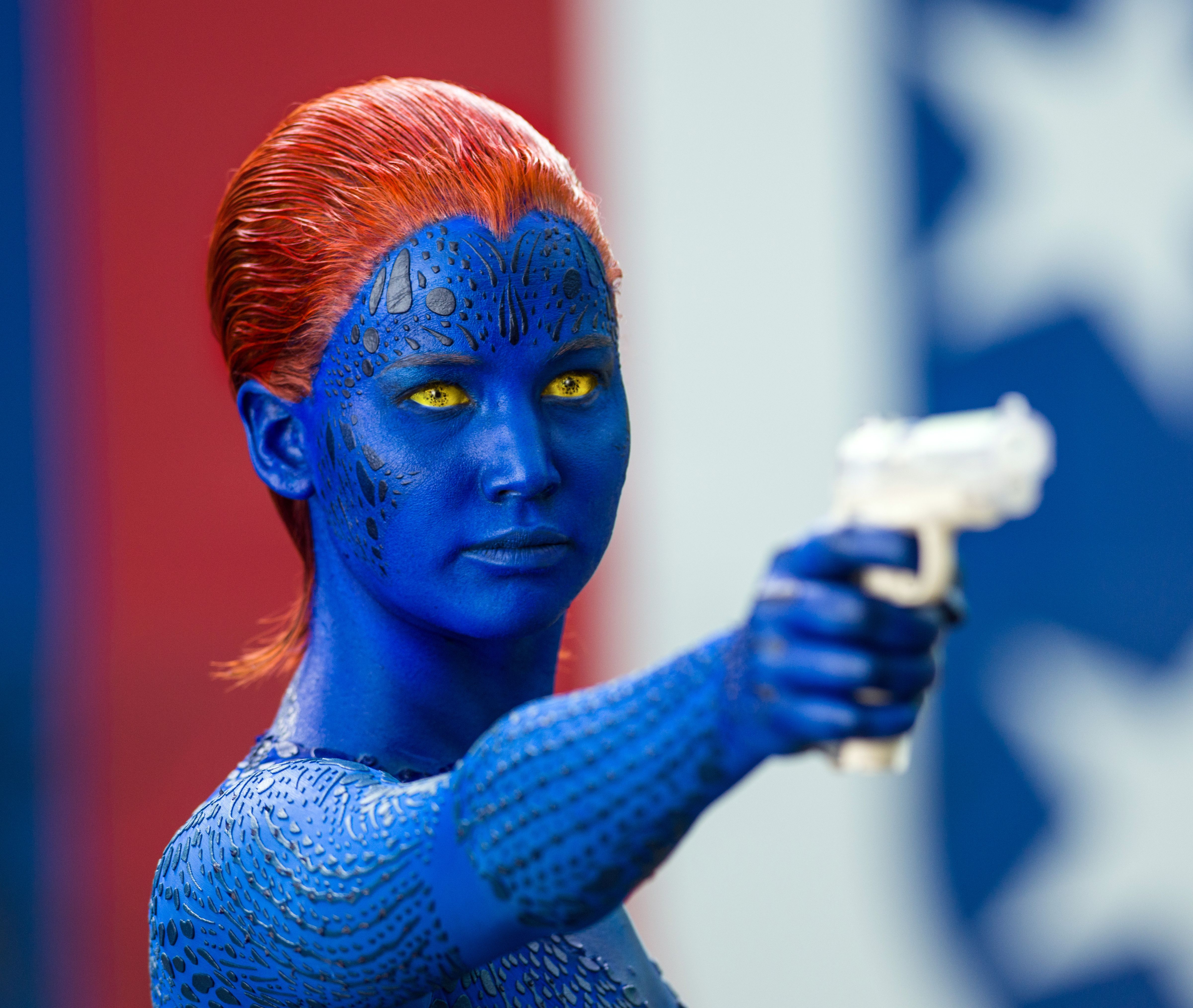 Jennifer Lawrence: blue skin, red hair, yellow eyes and a wh