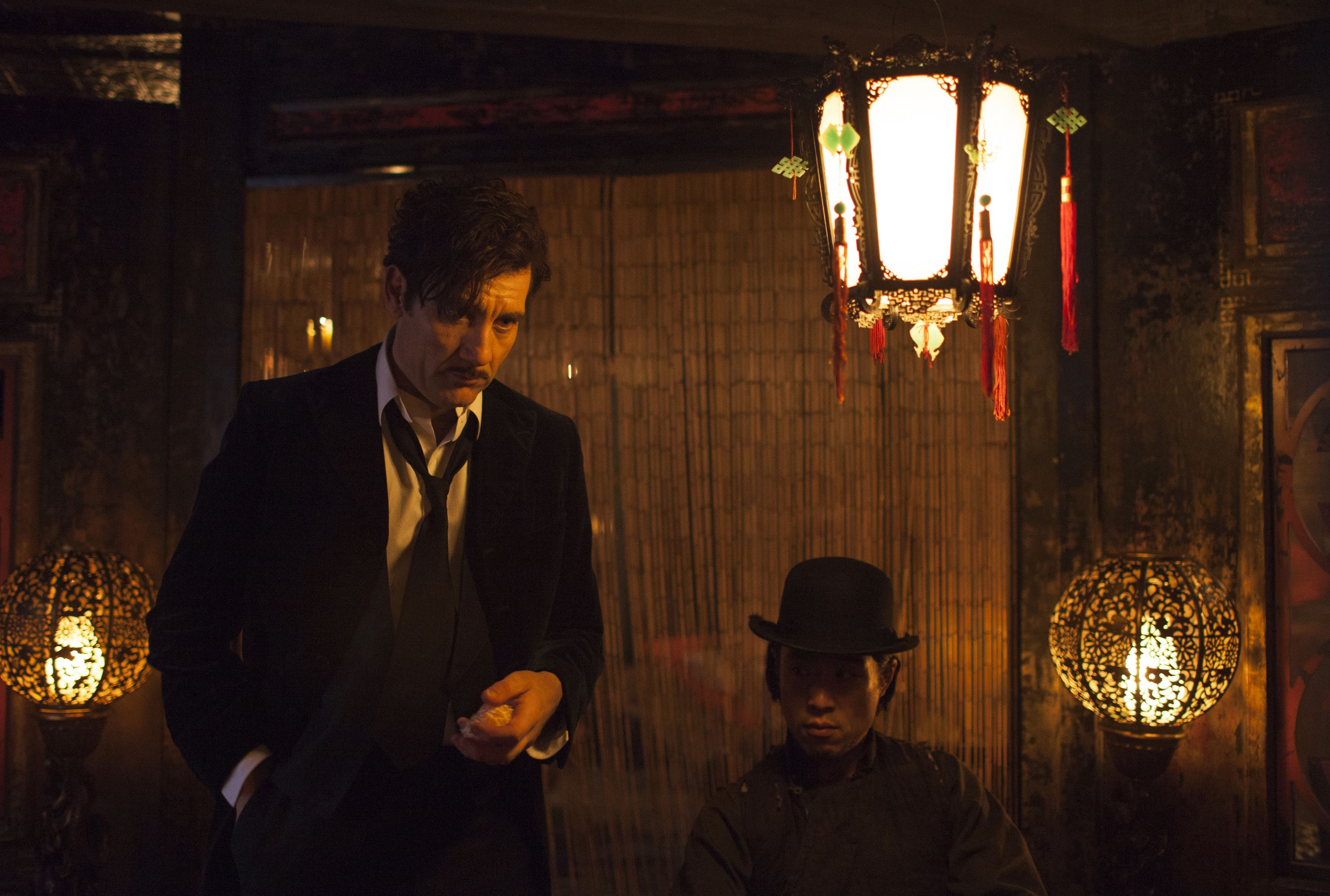 Clive Owen in a Chinese whorehouse or something