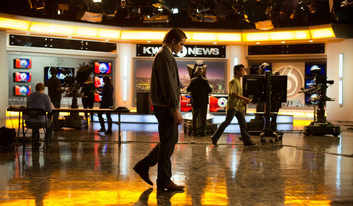 Jake Gyllenhaal walks around in the studio of Nightcrawler