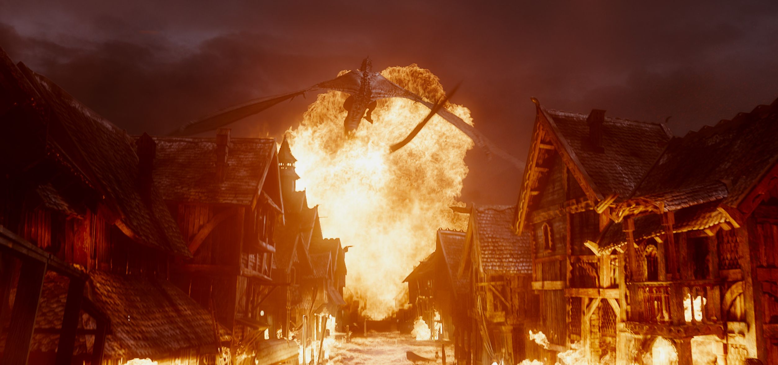 Dragon Smaug burns down village in The Battle of the Five Ar