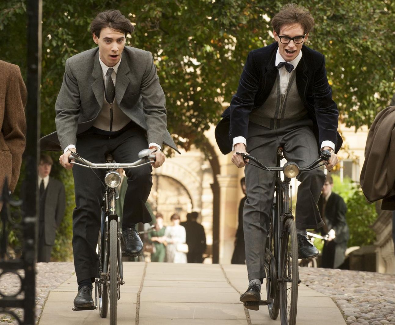 Harry Lloyd and Eddie Redmayne cycle around in The Theory of