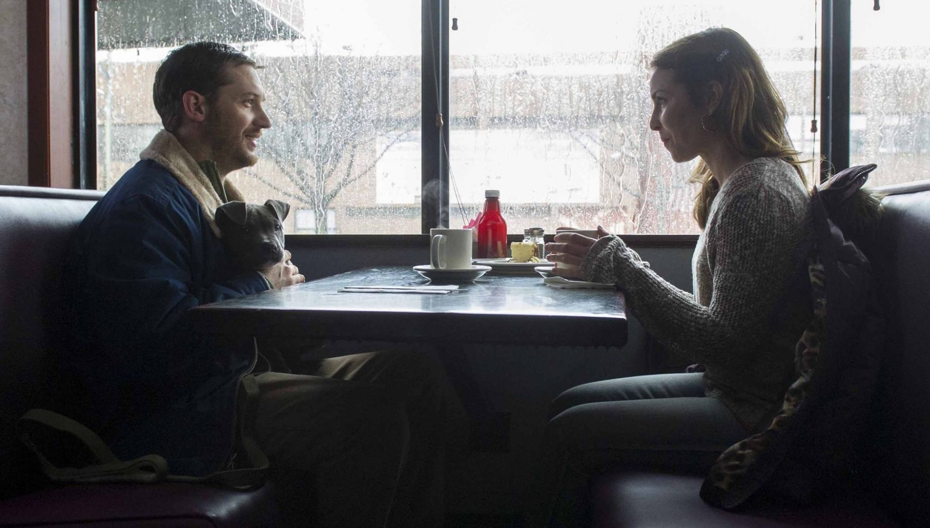 Tom Hardy and Noomi Rapace in diner