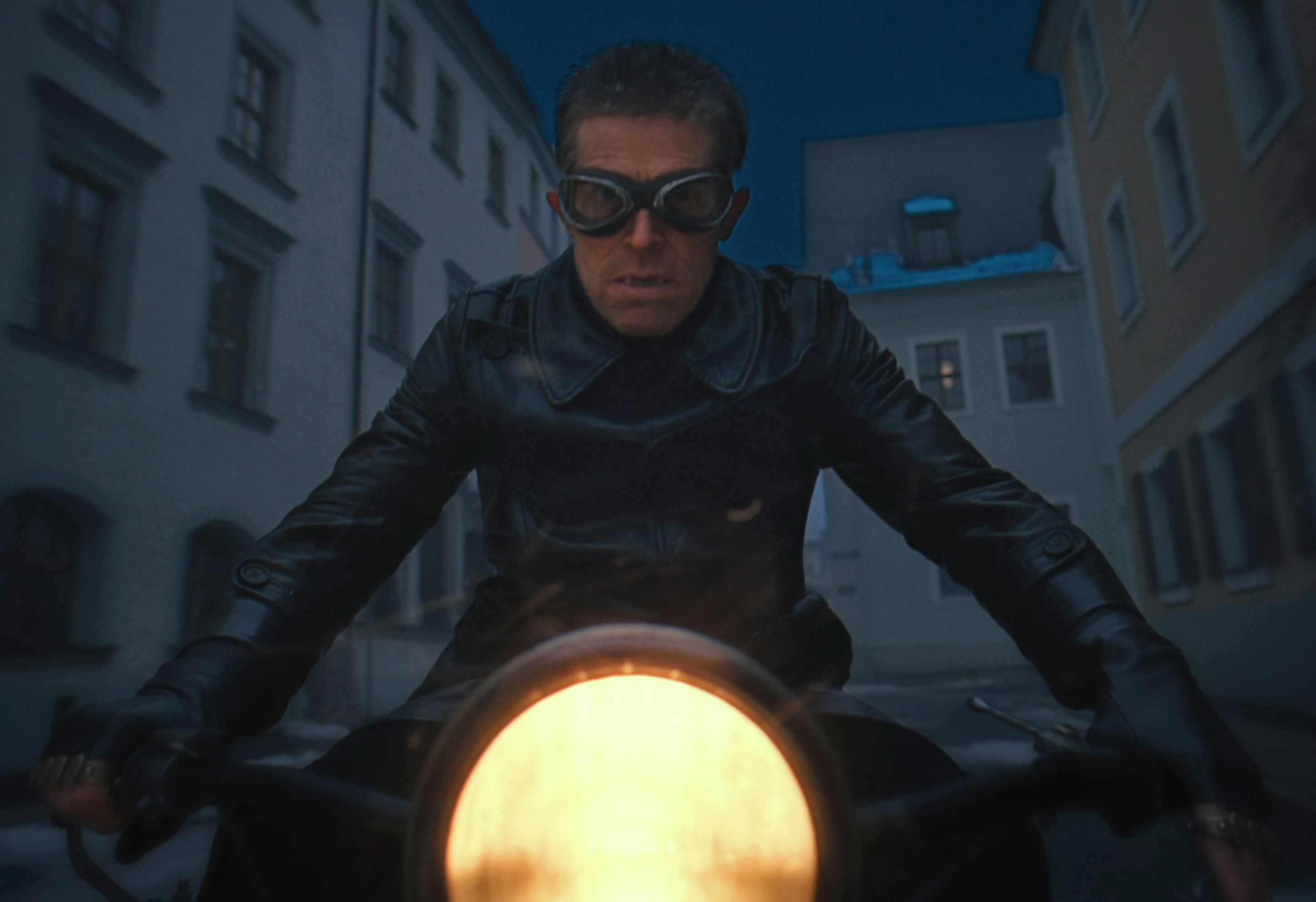 Willem Dafoe as Jopling on motorcycle in The Grand Budapest 