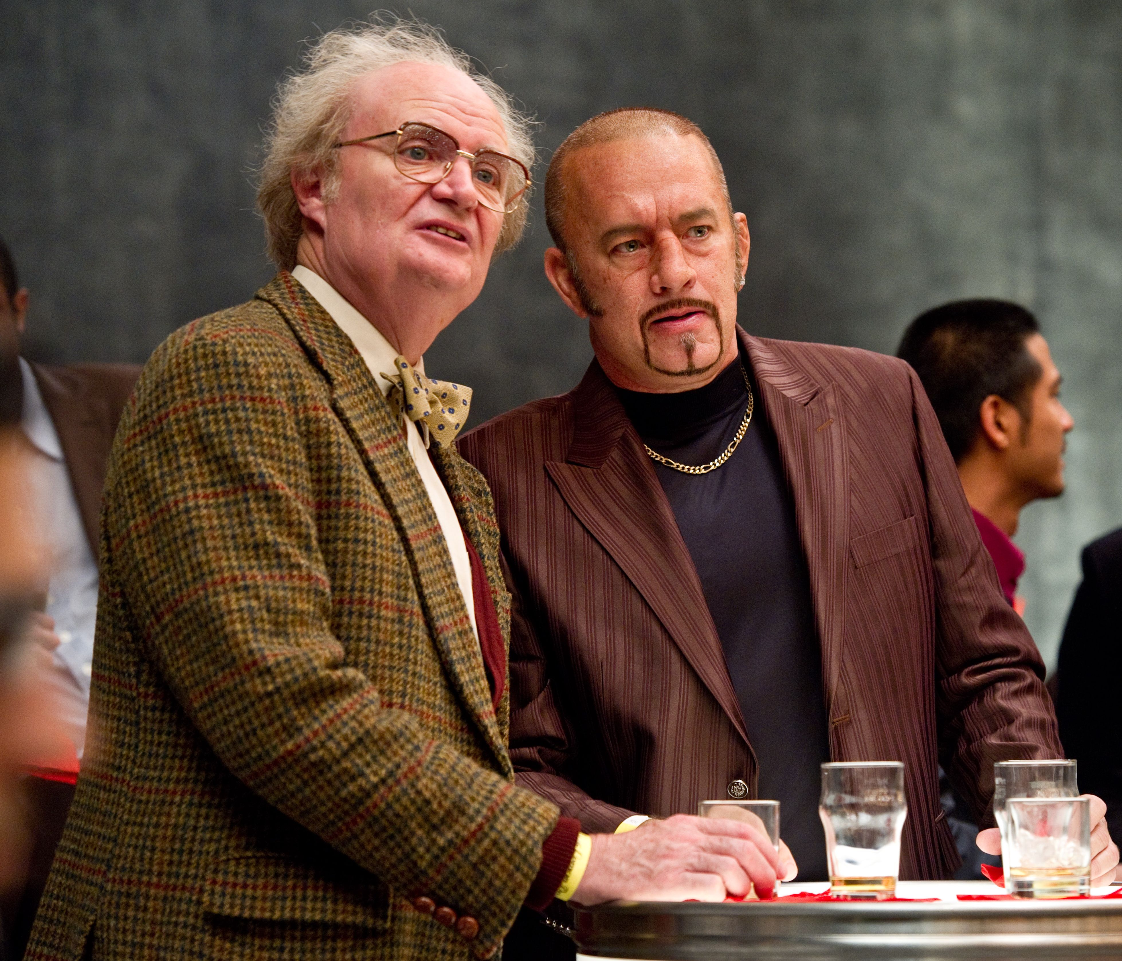 Jim Broadbent and Tom Hanks as Dermot Hoggins having a drink