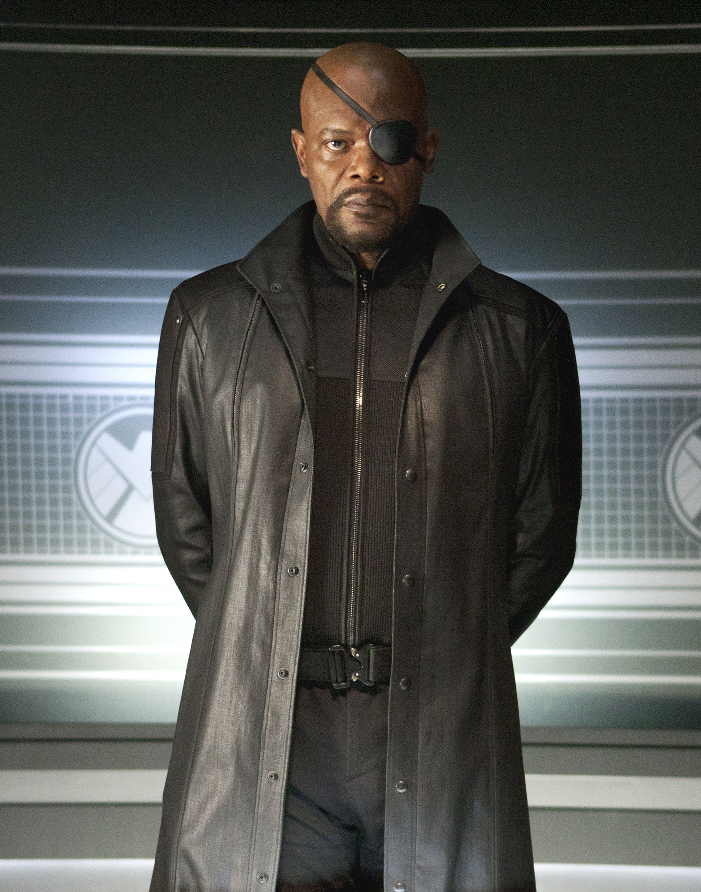 Samuel L. Jackson in black as Nick Fury