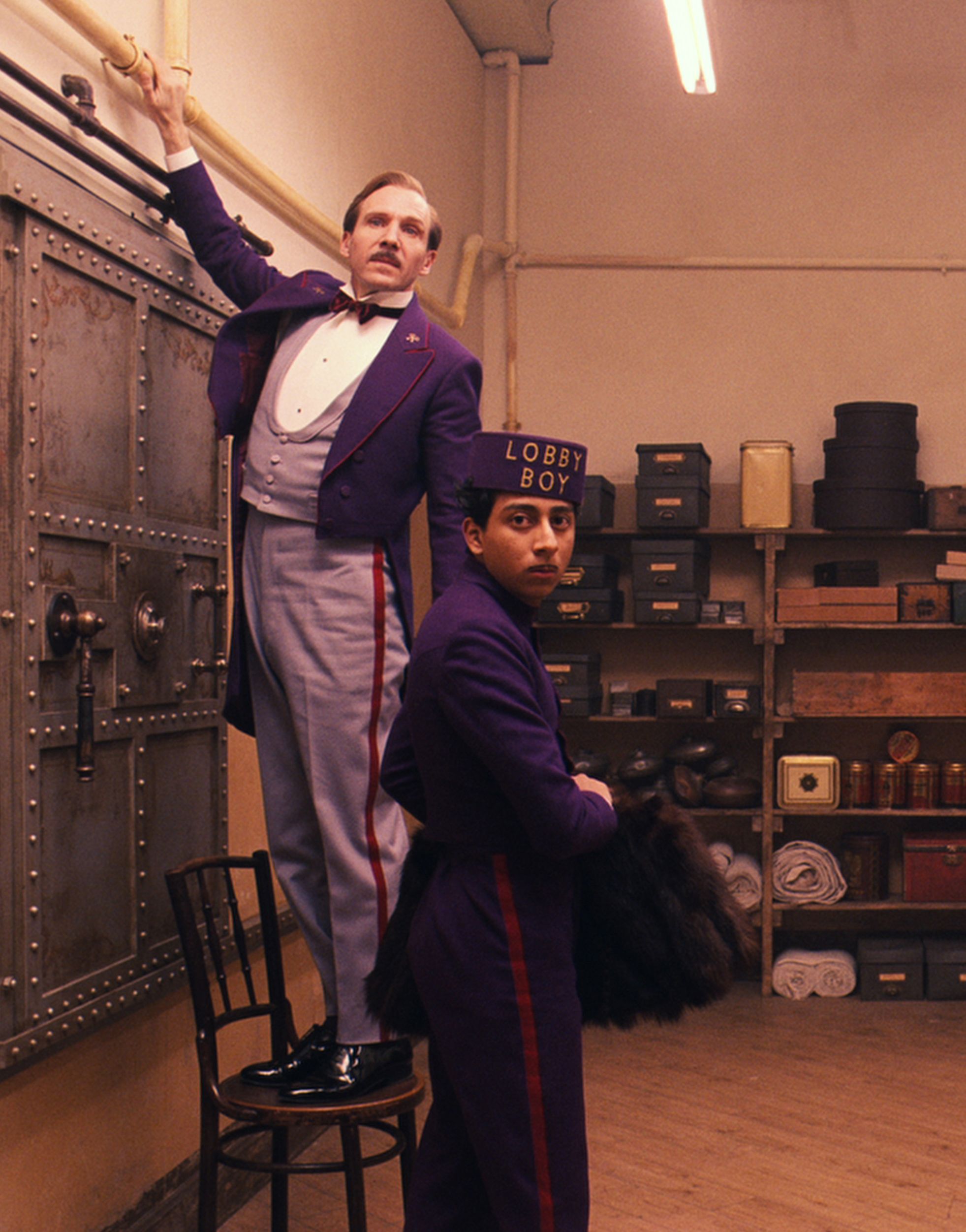 Gustave and lobby boy caught - The Grand Budapest Hotel.