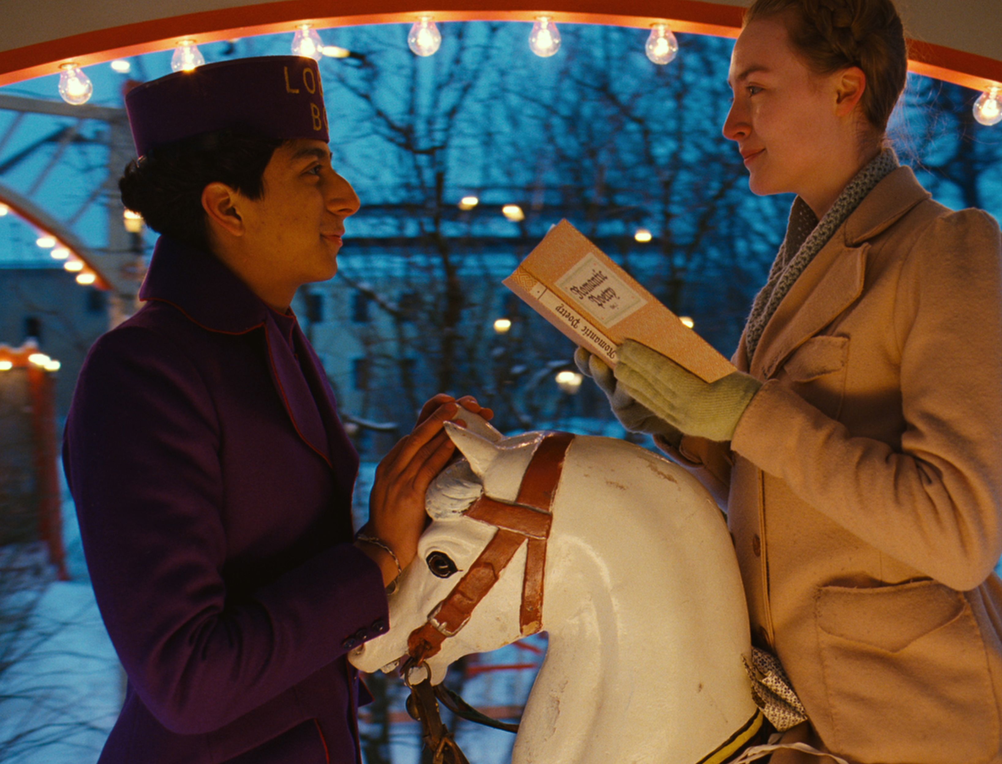 Tony Revolori and Saoirse Ronan having a moment on a horse