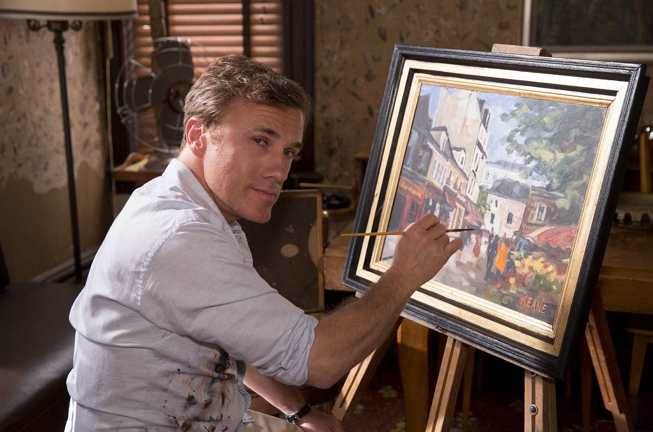 Keane (Christoph Waltz) paints a landscape.