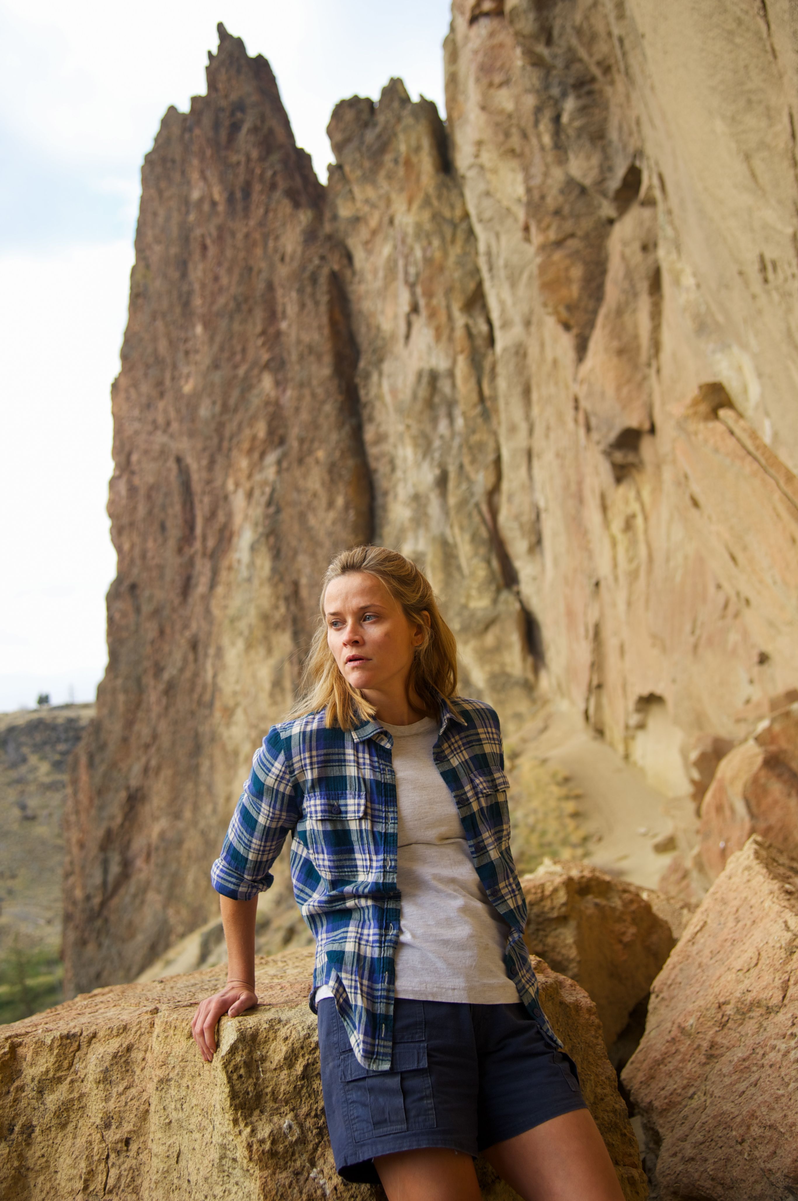 Reese Witherspoon between rocks