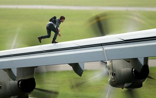 Tom Cruise on airplane wing