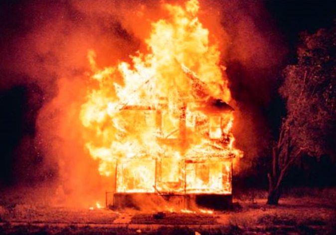 the symbol of lost hope, a house on fire