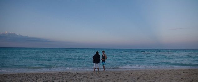 Jonah Hill and Miles Teller on the beach