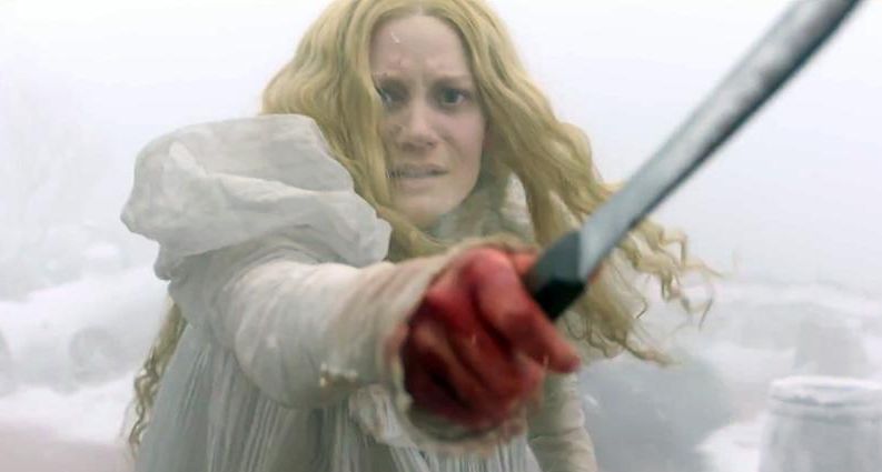 Mia Wasikowska scared and bloody in Crimson Peak