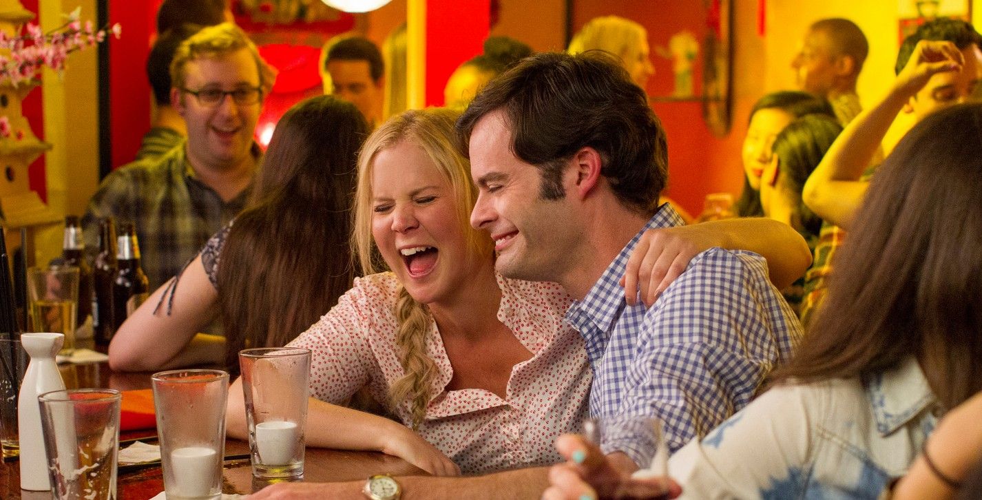 Amy Schumer and Bill Hader at a bar