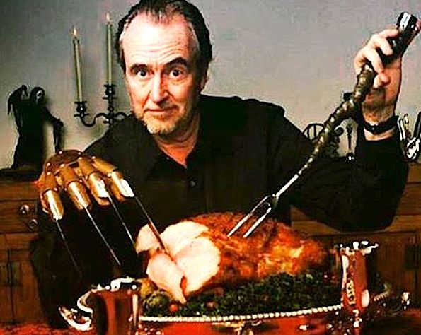 Wes Craven carving a turkey the right way.