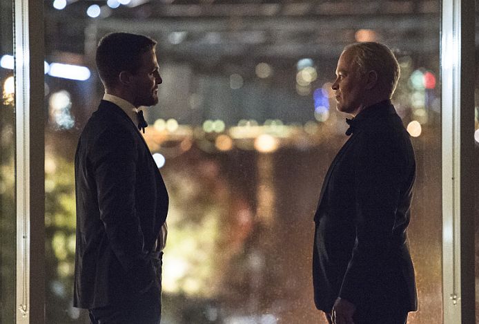 Oliver Queen meets Damian Darhk as Oliver