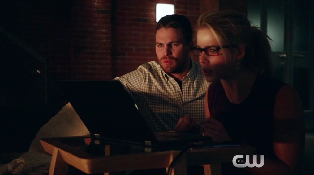 Felicity Smoak & Oliver Queen talk to Ray Palmer, who is ali
