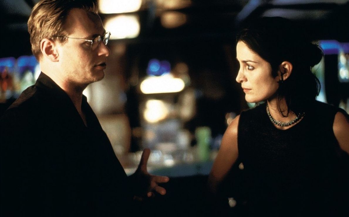 Director Christopher Nolan with Carrie-Anne Moss