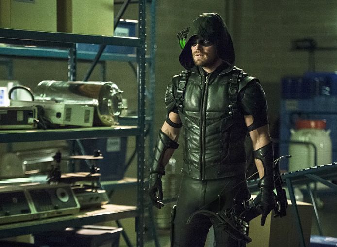 Oliver Queen/Green Arrow on mission to rescue Ray Palmer/ATO