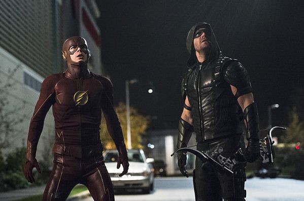 The Flash, Green Arrow looking up at threat