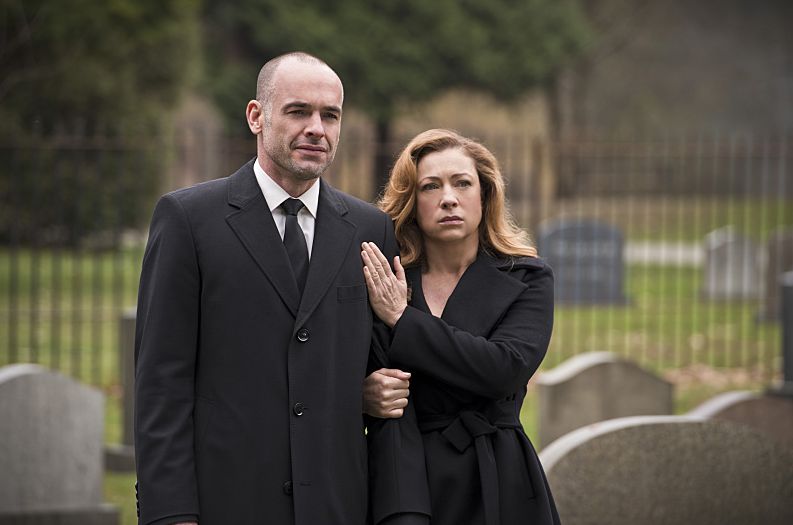 Quentin and Dinah Lance at daughter Laurel's funeral