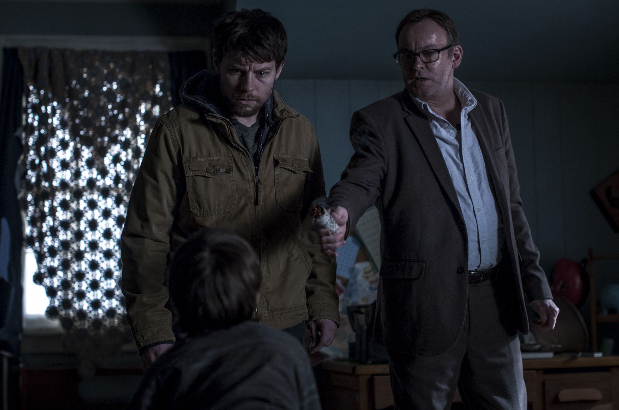 Patrick Fugit and Philip Glenister in 'Outcast'