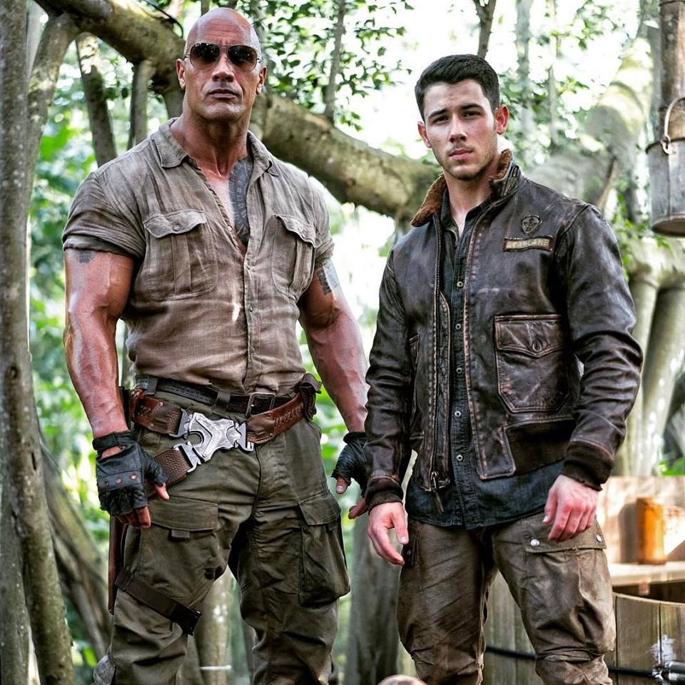 Dwayne Johnson and Nick Jonas on the set of Jumanji