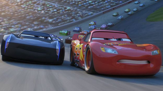 Jackson Storm and Lightning McQueen battle for the lead in "Cars 3"