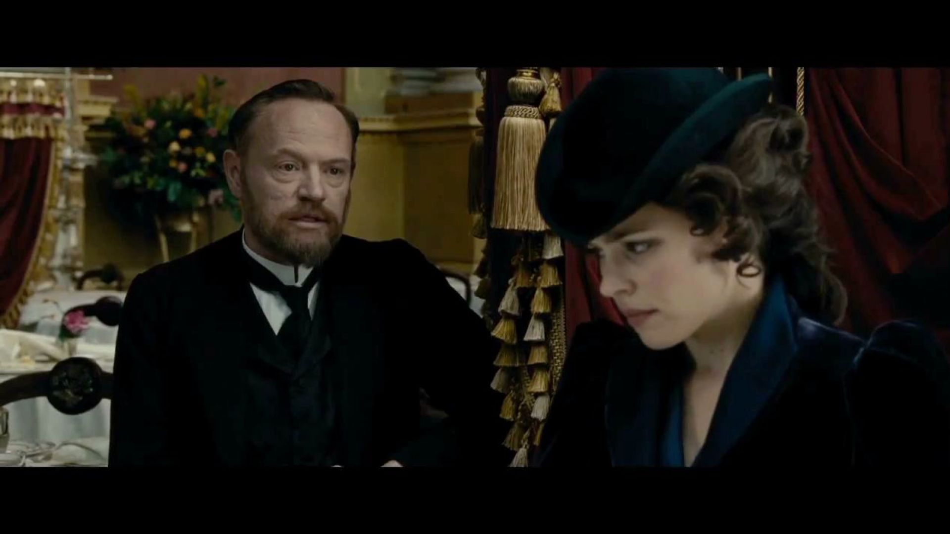 Professor Moriarty talks to Irene Adler about his plans in Sherlock Holmes 2