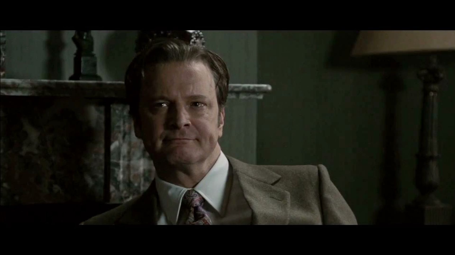 Gary Oldman finds Colin Firth in his house without shoes on in Tinker Tailor Soldier Spy